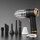Black-and-gold cordless mini car vacuum with attachments, filter and USB-C cable