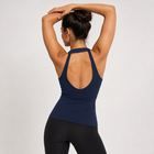 Back view showing the open-back halter design of the navy sports tank top