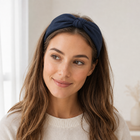 Woman wearing the deep navy wide knotted headband with loose hair